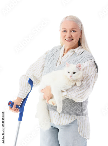 Mature woman with crutch an...