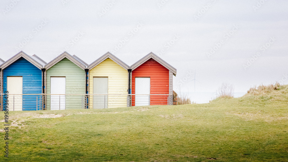 Obraz premium Blyth Beach Huts, on a overcast Spring day, Blyth, Northumberland, March 2026