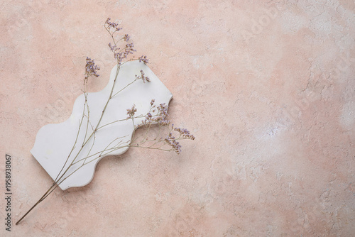 Plaster podium and dried fl...