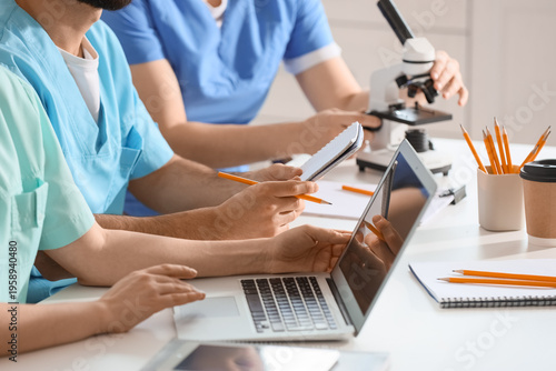 Doctors with laptop and mic...