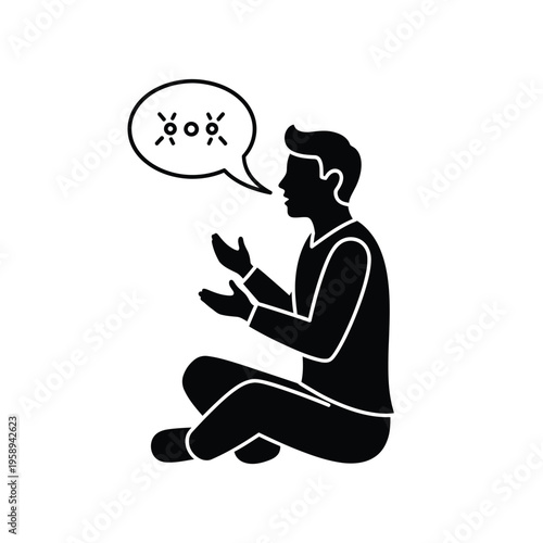 Man sitting on floor talking with speech bubble above his head.
