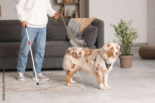 Blind young man with stick ...