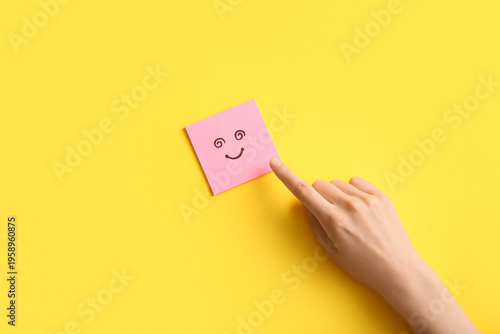 Female hand with sticky not...