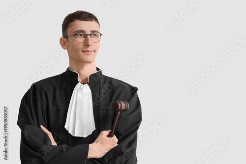 Male judge in eyeglasses wi...