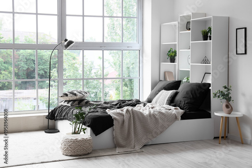 Interior of bedroom with sh...