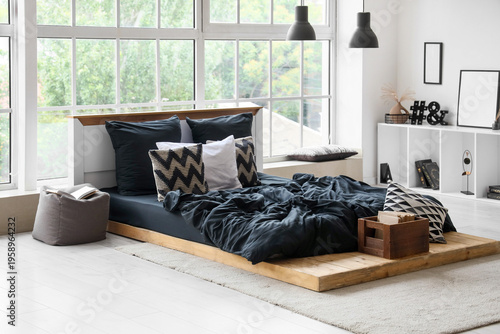 Interior of bedroom with sh...
