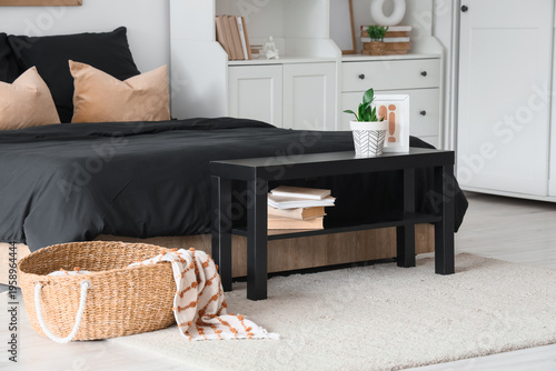 Interior of bedroom with ho...
