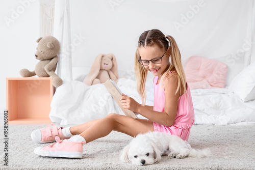 Cute little happy girl with...