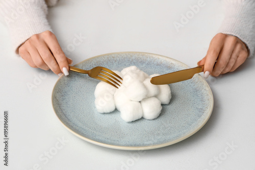 Female hands with plate of ...