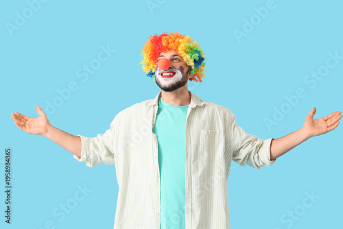 Young man in clown disguise...