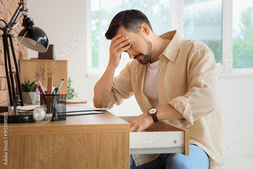 Young man having panic atta...