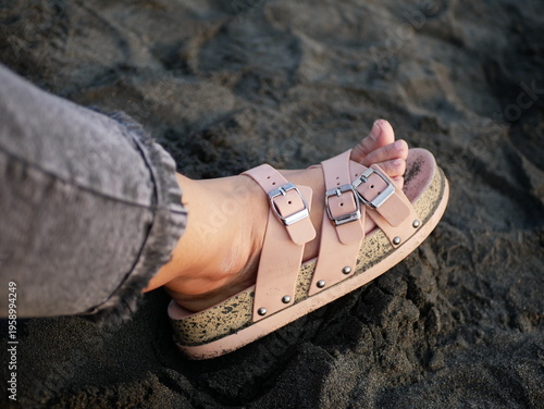 Summer Vacation Concept with Sandals on the Beach