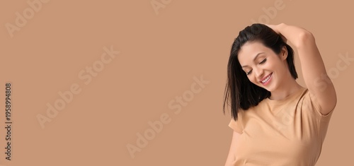 Beautiful young woman with ...