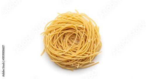 Close up of a nest of spaghetti pasta on a white surface food texture