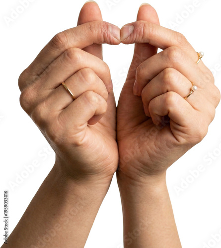Two hands making a heart shape gesture with rings isolated