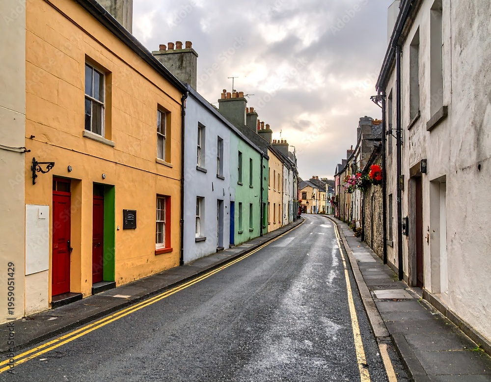 Fototapeta premium Colorful Street in Kinsale, Ireland - A Picturesque Urban Scene.