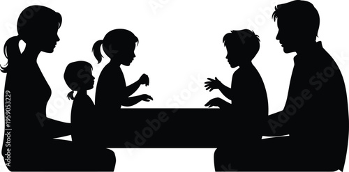 Black silhouette of a happy family with three children sitting together at a table for dinner on a white background.
