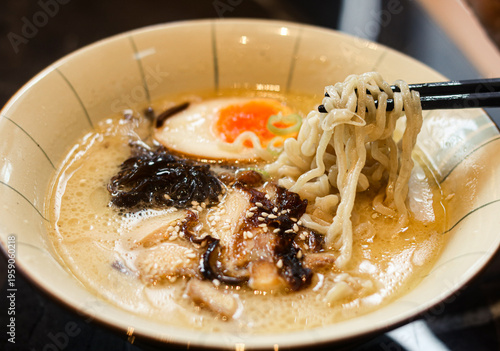 Quadro em tela One bowl of Chicken Ramen, featuring springy noodles in a rich, savory broth