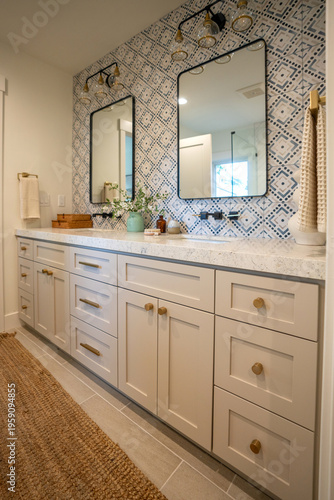 Photography Modern Bathroom Vanity with Dual Mirrors, White Cabinetry, Brass Hardware, and B
