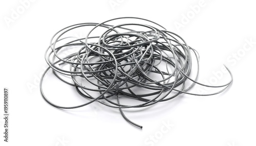 A tangled heap of thin metal wires against a white background