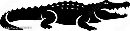 silhouette of a black crocodile