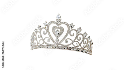 This tiara shows intricate designs with heart shapes and sparkling gems shining brightly under soft light in a simple setting