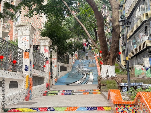 Schilderij op canvas colorful mosaic stairs with urban street art painting in a local neighborhood of