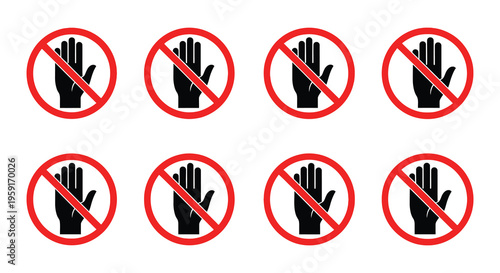 Multiple prohibition signs featuring a black hand with a red circle and slash