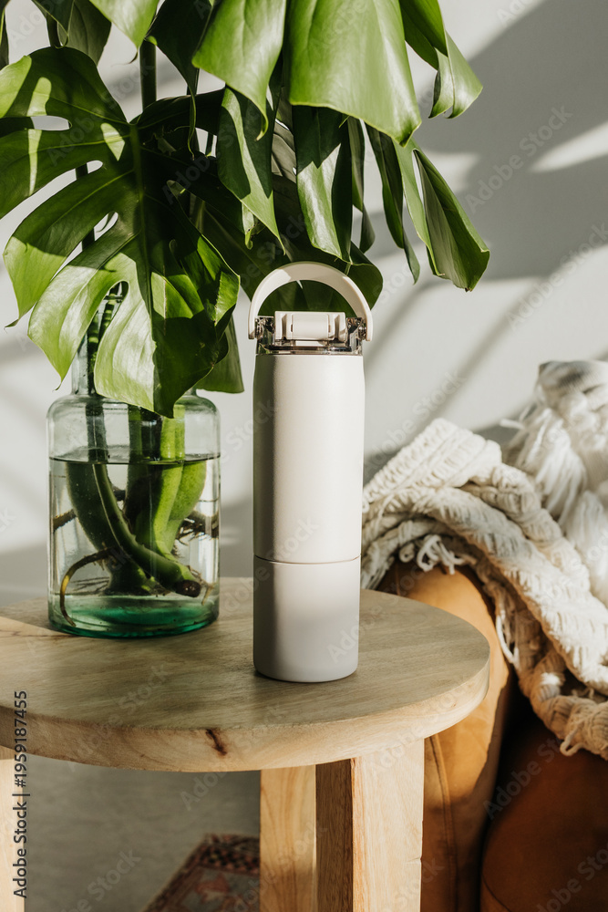 custom made wallpaper toronto digitalBeige water bottle sits on end table next to tropical plant