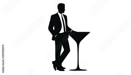 A man in a suit silhouette standing with a martini glass