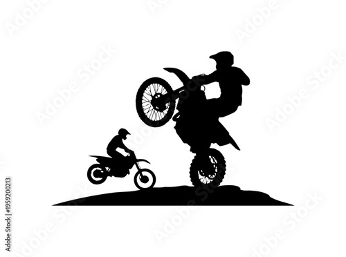 Silhouette of Motocross Riders Performing Stunt