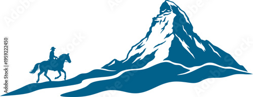 Lone rider traveling toward a high mountain peak