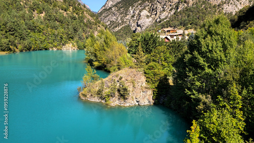Guil River with turquoise water and green trees, French Alps, Hautes Alpes, France, Europe.