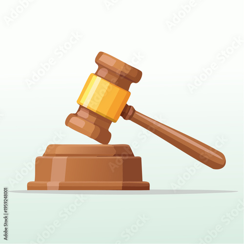 A judge's gavel rests on a sound block in a courtroom setting.
