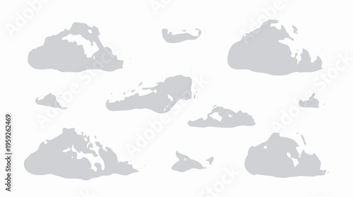 Collection of Various Cloud Shapes Over a Clear Sky in Different Silhouettes