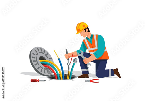Skilled electrician kneeling and fixing colorful wires and cables emerging from a manhole cover using tools