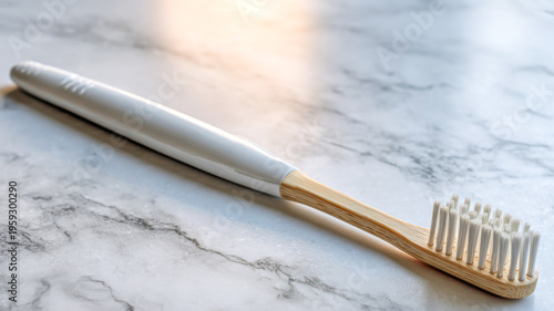 Natural bamboo toothbrush resting elegantly on a smooth marble countertop, reflecting gentle morning light and promoting eco-friendly dental care routines