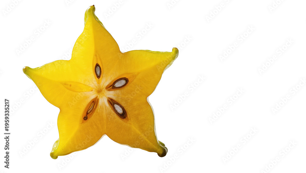 Fototapeta premium Vibrant yellow star fruit cross-section with five points and visible seeds
