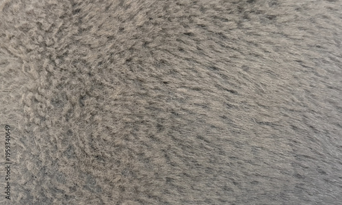 柔らかいダークブラウンのフェイクファー背景テクスチャ。温かみのある毛足の長い質感