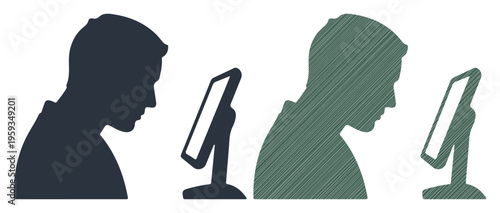 Two individuals focused on computer screens, symbolizing concentration and digital engagement