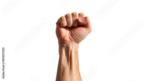 Foto Clenched human fist raised up in a powerful gesture of strength and determinatio