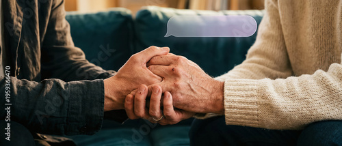 Close up of hands holding senior hands with chat bubble icon for mental health support, elderly care assistance, counseling app and empathy concept at home.