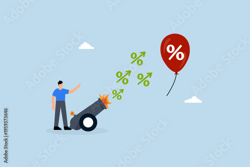 Inflation reduction act by FED, Businessman banker firing interest rate cannon at inflation balloon