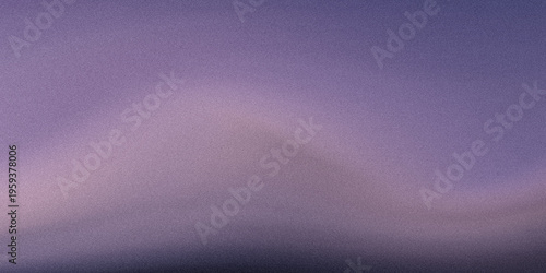 A serene and mystical twilight sky with subtle clouds and a gradient of purple and blue hues.