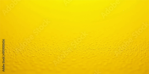 Macro close up of a yellow sponge surface with a wet pattern of abstract liquid bubbles and gold water drops on a clean orange texture