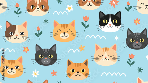 Adorable seamless pattern of various cartoon cat faces and small colorful flowers on a light blue background.