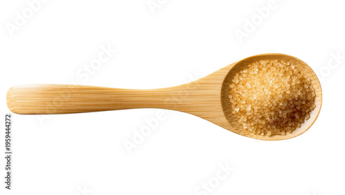 Fotografia Natural raw cane sugar crystals in a wooden spoon, perfect for sweetening drinks