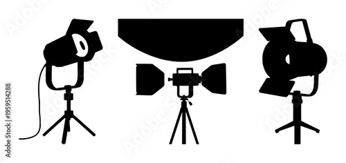 Spotlights set with solid black silhouette of a vintage theatrical spotlight on a stand featuring film noir, precise edges, white background with black silhouette and spotlight