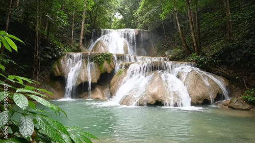 Tiered Tropical Waterfall With Turquoise Pool in Lush Rainfores