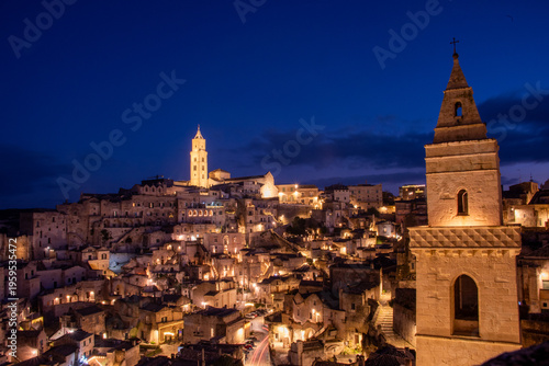 Tableau sur toile Matera in the blue hour, when the Sassi glow softly beneath a deepening southern sky